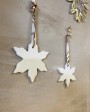 White ceramic star to hang up